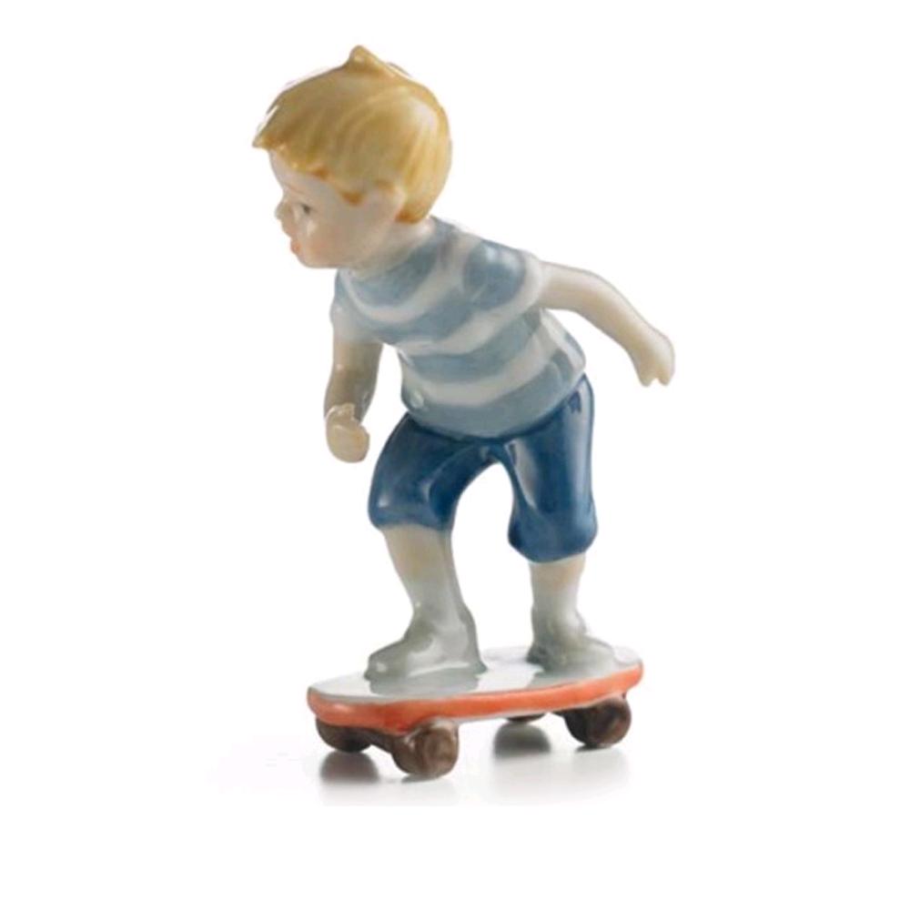 ROYAL COPENHAGEN BAMBINO CON SKATEBOARD MINI COLLECTION